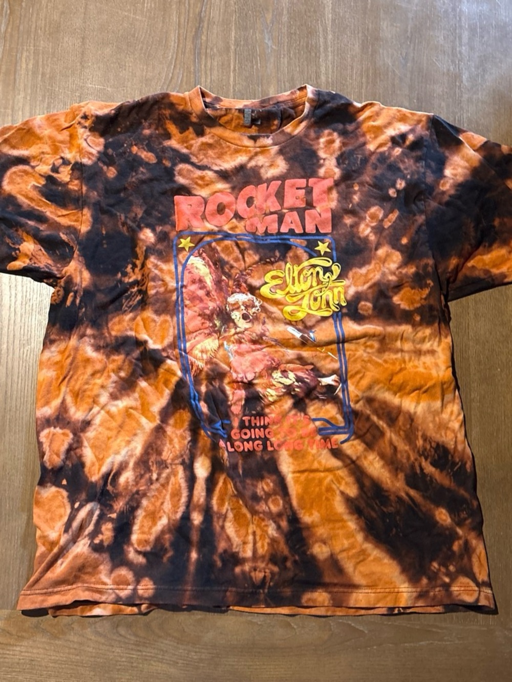 Hot Topic Orange and Black Tie-Dye Rocket Man Elton John Graphic Tee